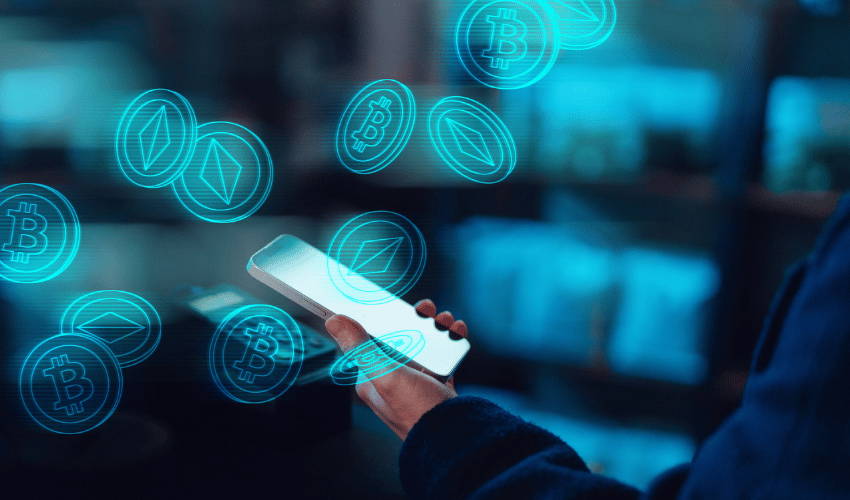 Person holding a smartphone with floating cryptocurrency icons in a digital interface